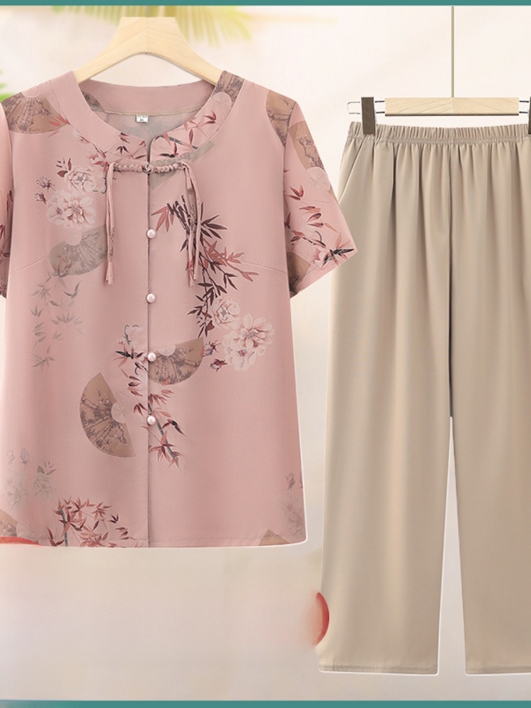 Summer Clothing Over 60 - طقم صيفي عصري من قطعتين بأكمام